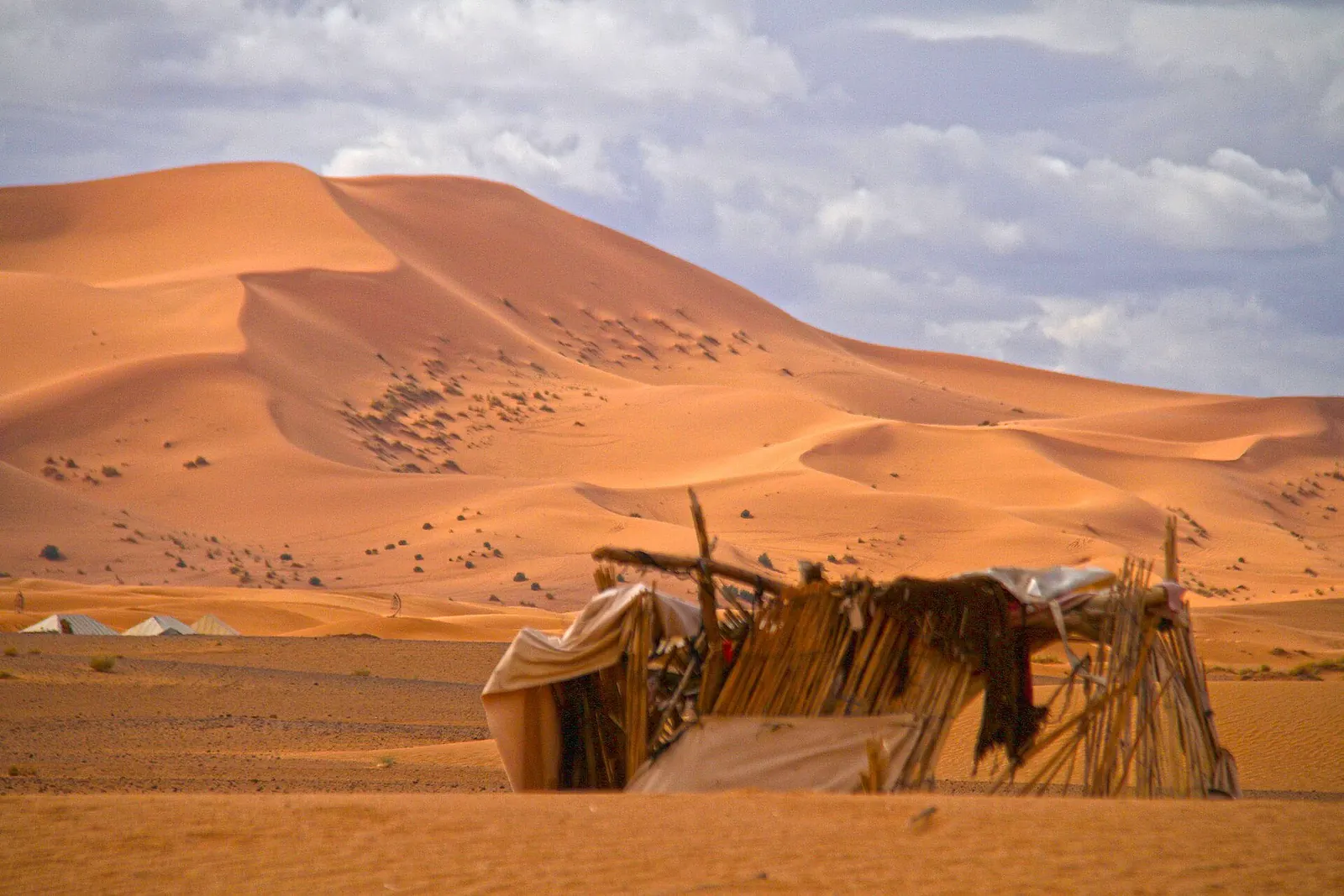 A Berber camp tucked below the dunes of Erg Chebbi