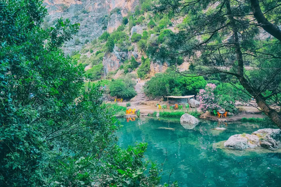 Turquoise river in the forested Akchour gorge
