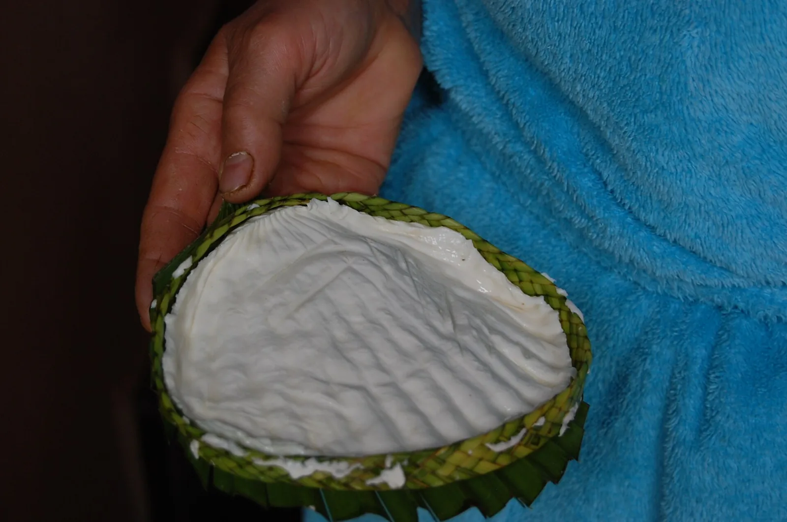 Fresh Rif goat cheese (jben) on a palm-leaf mat