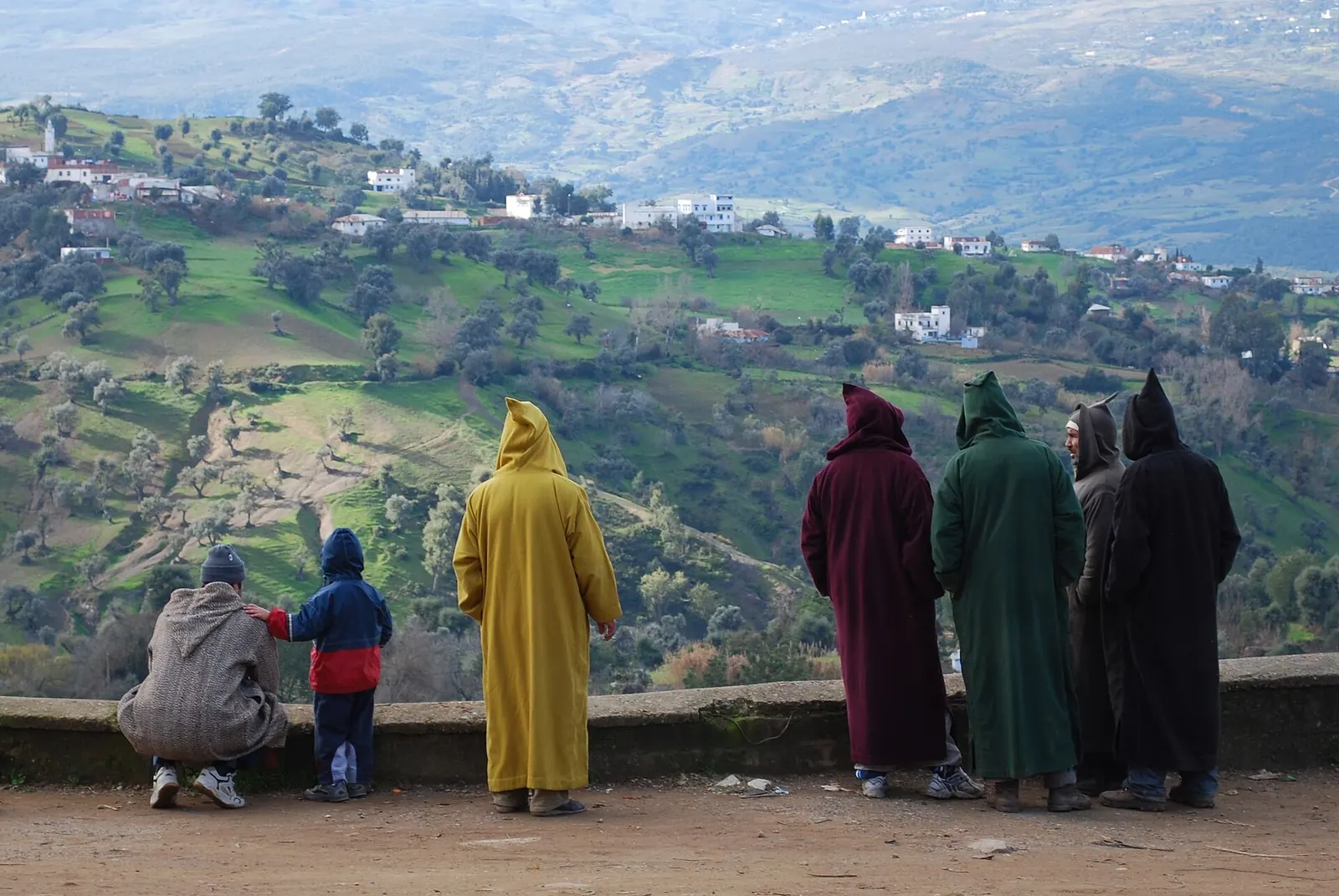 Men in djellabas at the weekly souk in Chefchaouen