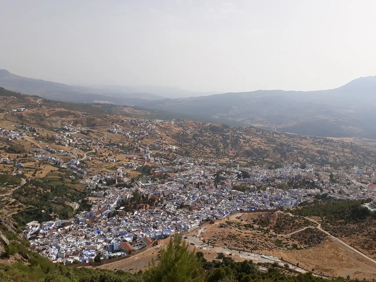 Hillside village in the Talassemtane area under hazy skies