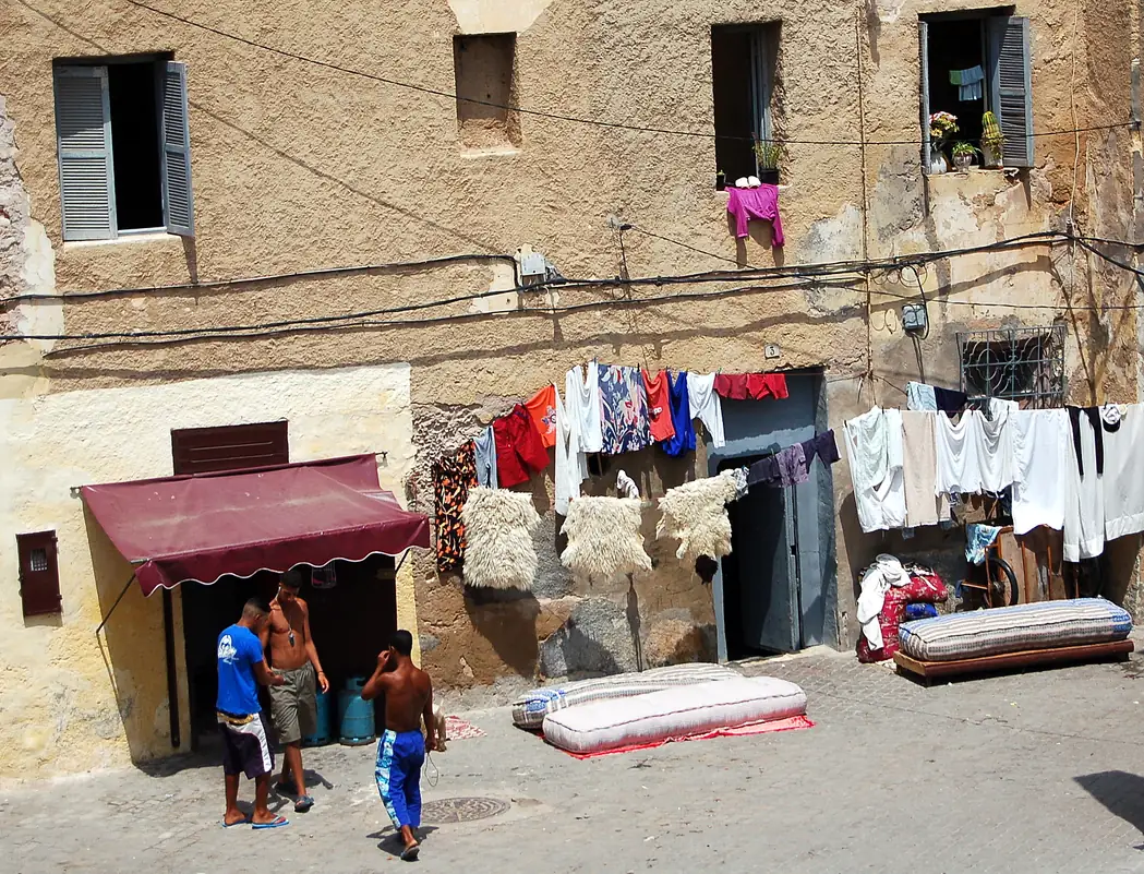 Shopfronts on a medina street in El Jadida