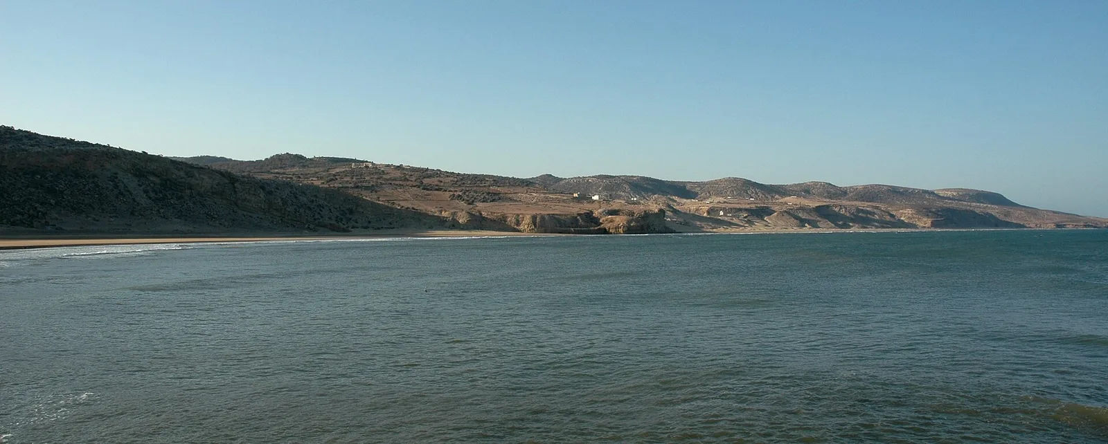 Atlantic coastline and hills near Iftane beach, south of Essaouira