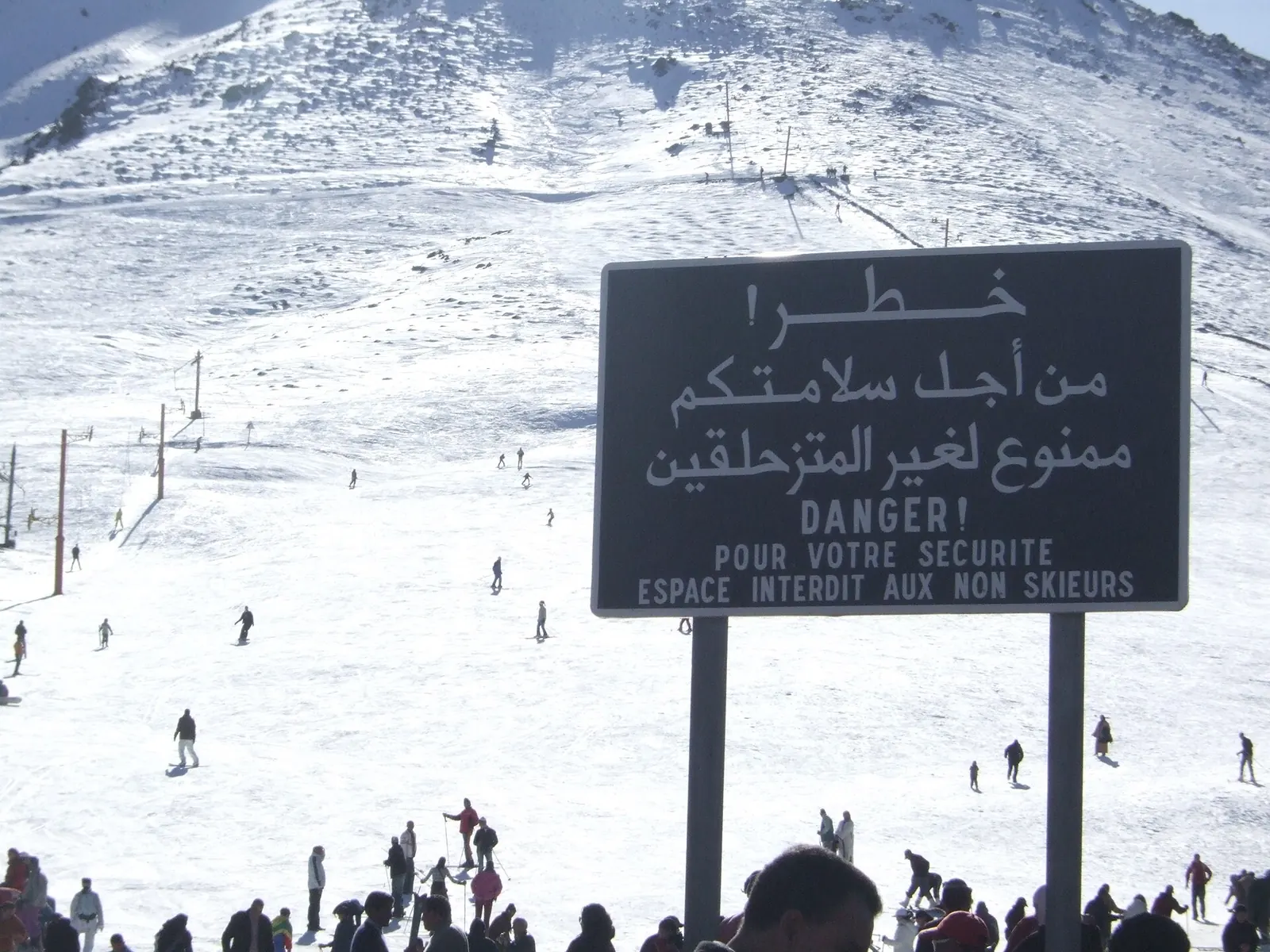 Skiers on the snowy slopes of Oukaimeden