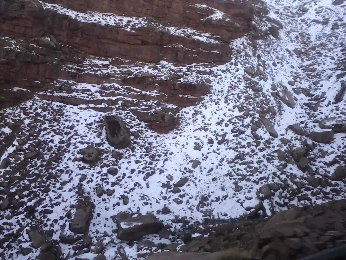 Rocky High Atlas slopes dusted with snow at Oukaimeden