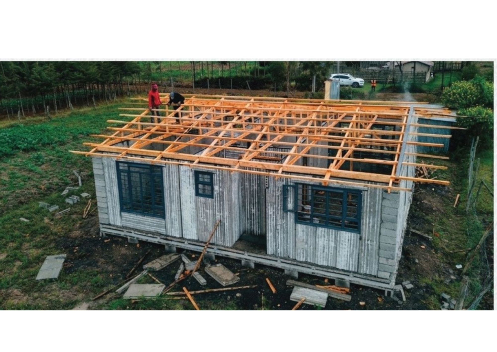2 Bedroom Fully precast: Roof Installation using Timber.