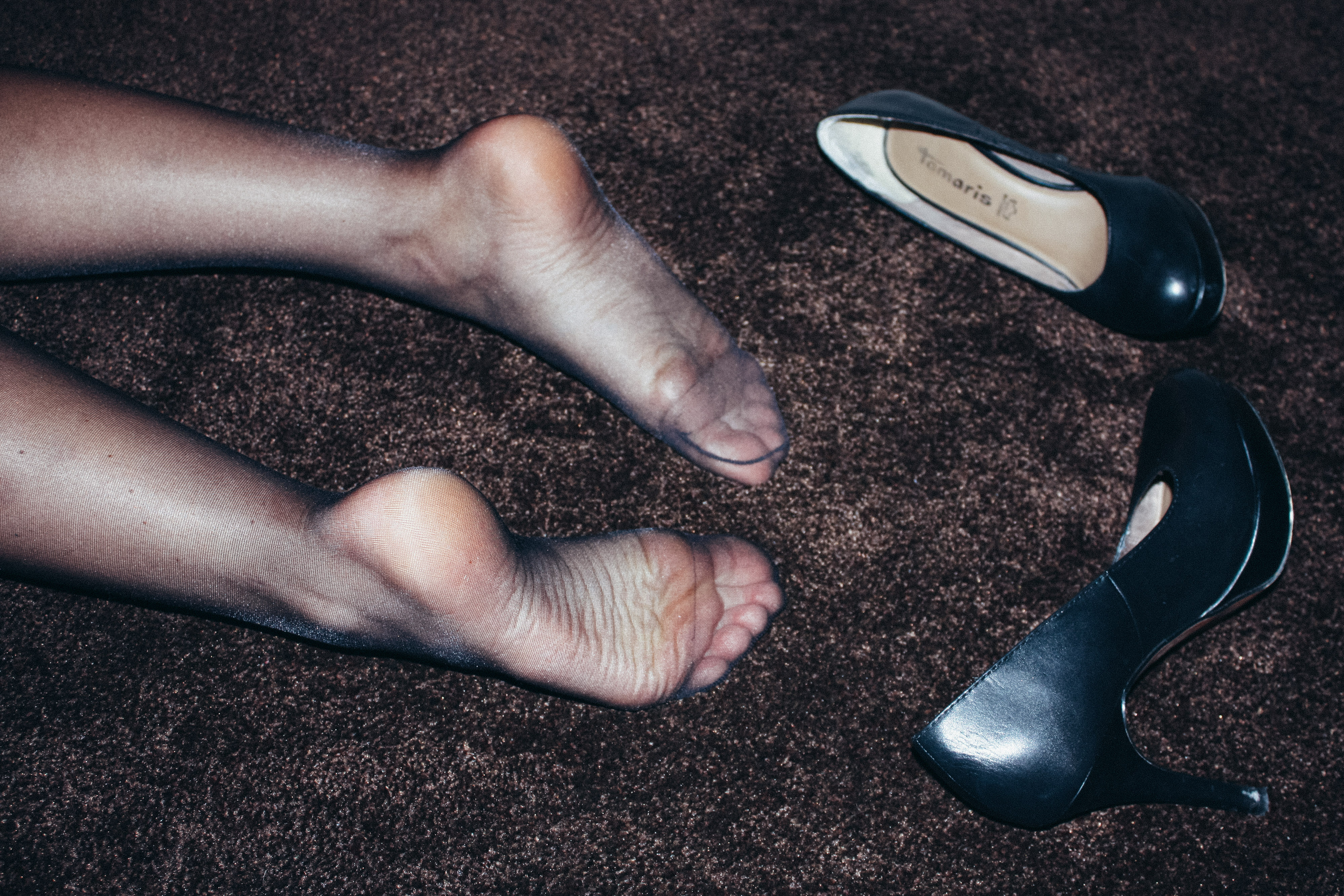a woman's nylon clad soles 