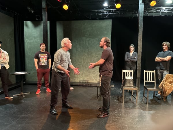 Michael Petted coaching actors during a scene study class