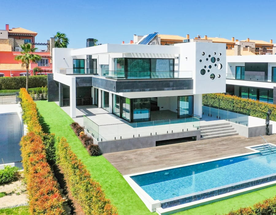 Modern villa with a swimming pool and landscaped garden