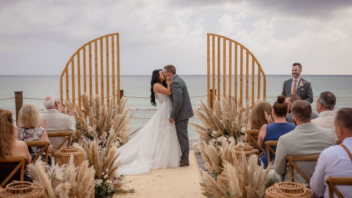 bride and groom at altar