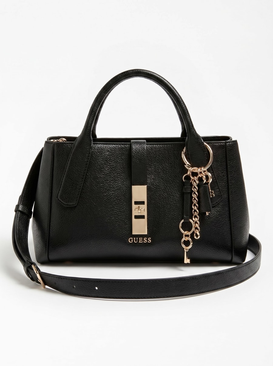 Bolso negro de American Vault fotografiado sobre fondo blanco