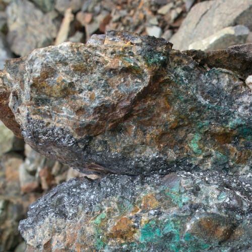 Rock sample showing malachite staining and hematite from Chaco Bear