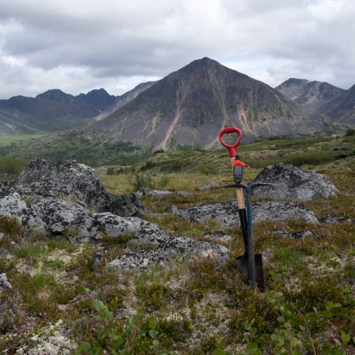 Basic soil sampling toolkit: grub-hoe, shovel, and GPS