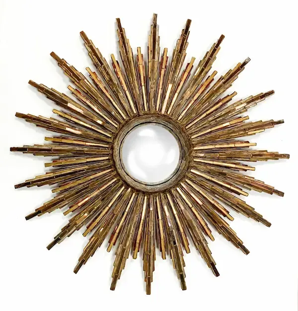 Miroir circulaire "Roi Soleil" de Line VAUTRIN (1913-1997). 