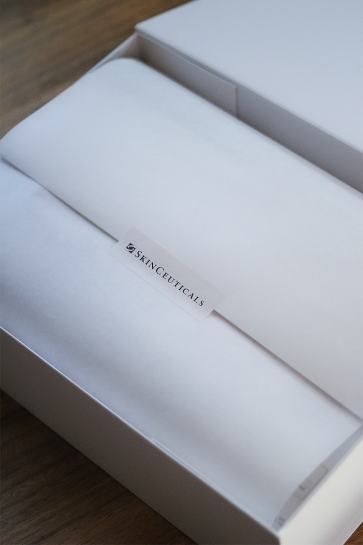 Completed SkinCeuticals gift box open showing all products arranged inside
