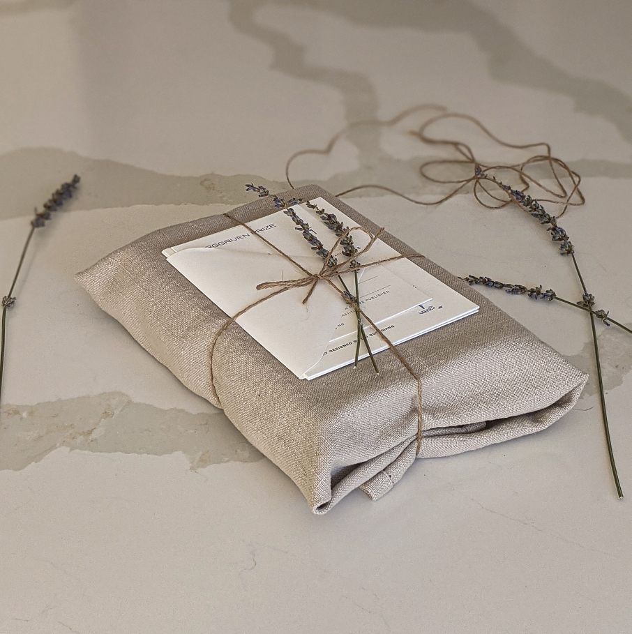 Custom metallic gold Berggruen Prize sticker on Dr. Paul Farmer's book