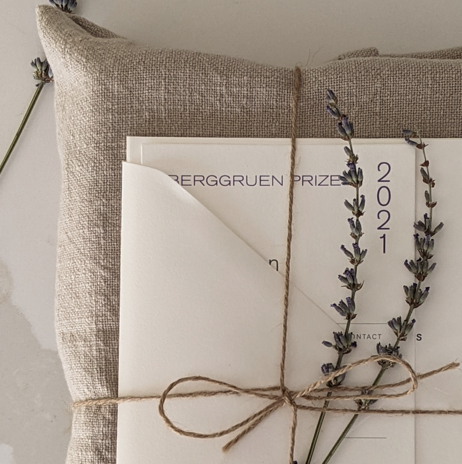 Letterpress invitation detail showing debossed typography on cotton stock