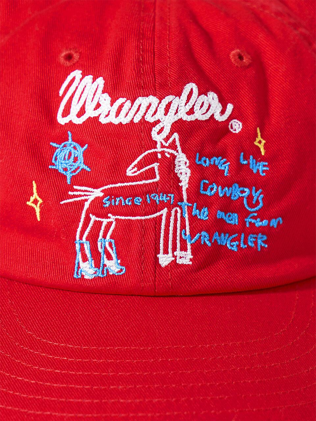 Detailed multi-color embroidery on a red baseball cap