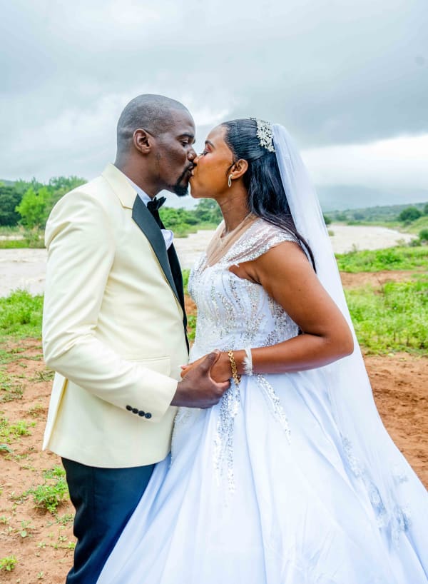 Couple sealing their union with a kiss 