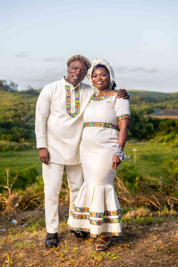 Sbali beaming with pride next to his new wife