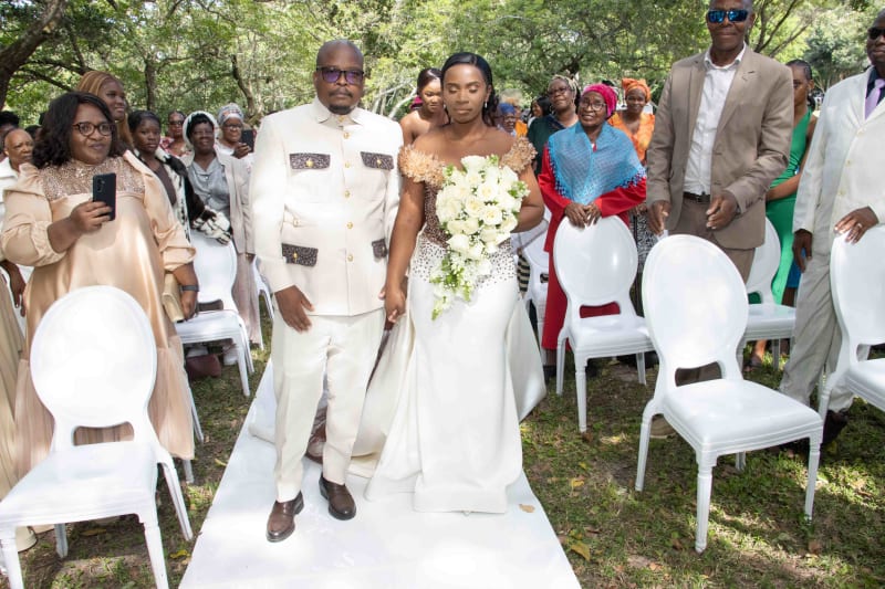 Couple posing on the white carper