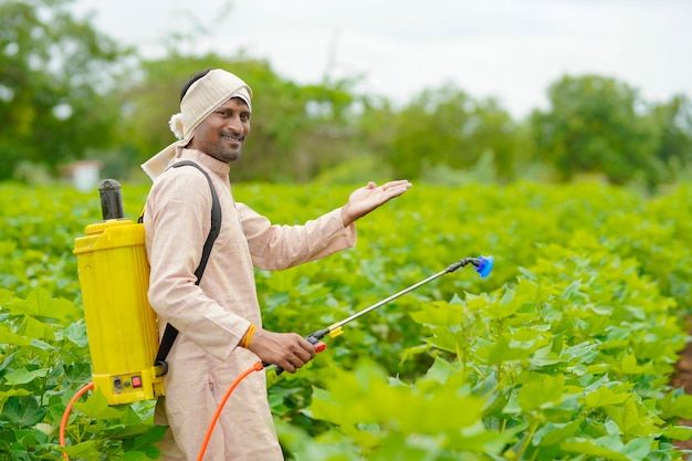 Farmer spraying pesticide