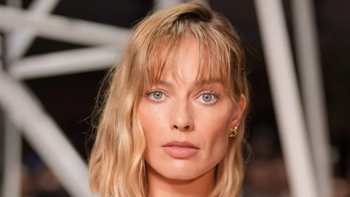 Leading hairdressers are making a massive claim about the secret meaning behind Margot Robbie's dramatic new haircut
