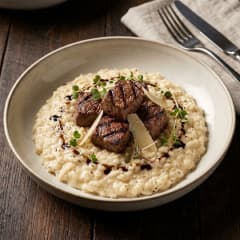 Risoto de parmesão com filé mignon