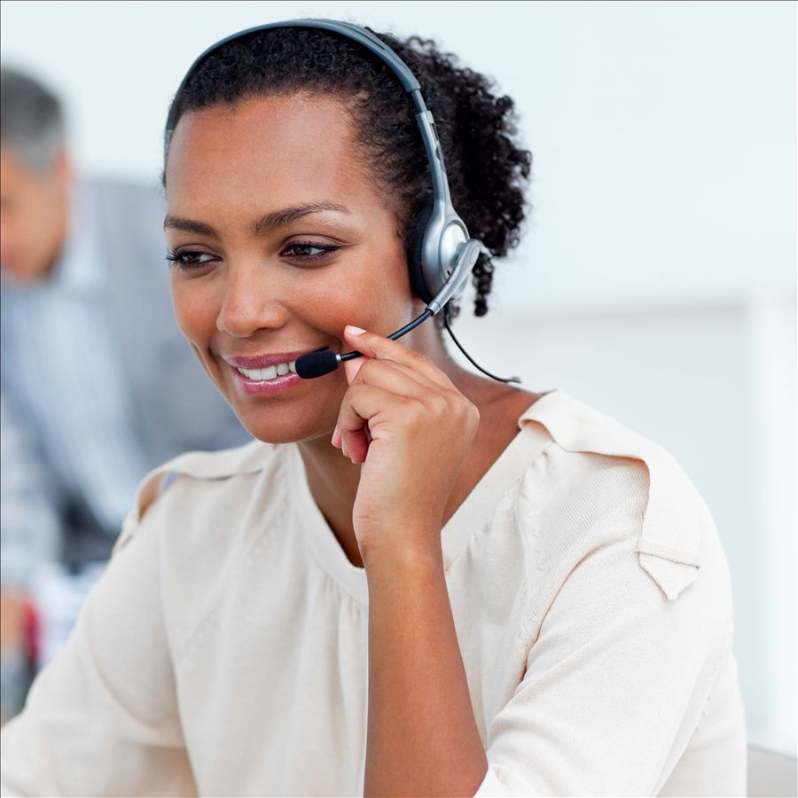 Customer support representative wearing a headset
