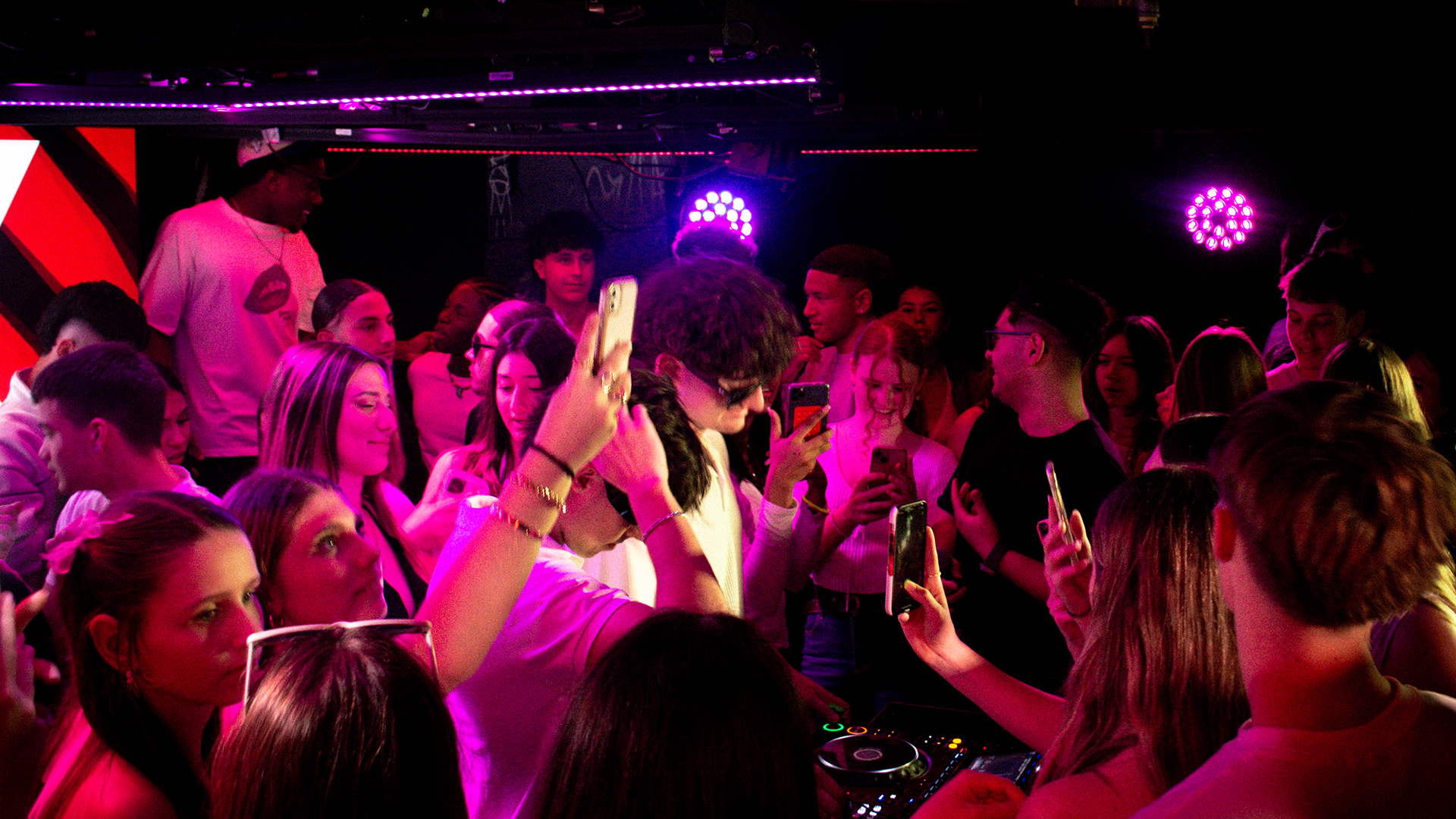 Tristan DJing with crowd around him