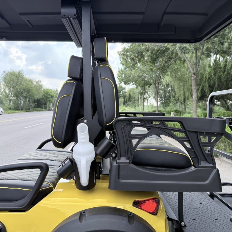 Close-up of the folding rear bench, cup holder and grab rail under the canopy