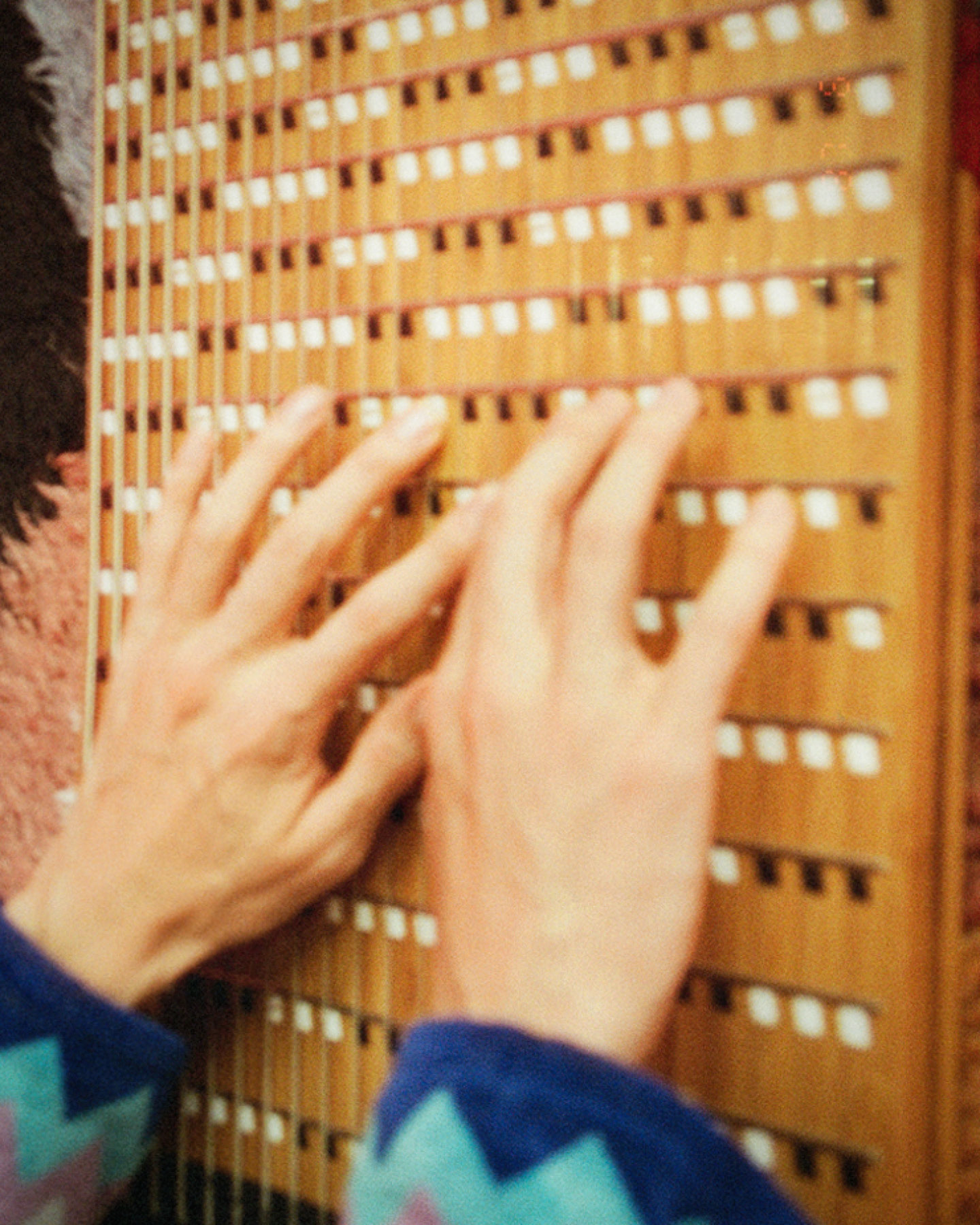 Jacob Collier in flow state, surrounded by instruments and LEGO Birds of Paradise