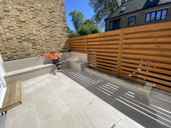 Wimbledon garden after patio and custom bench installation