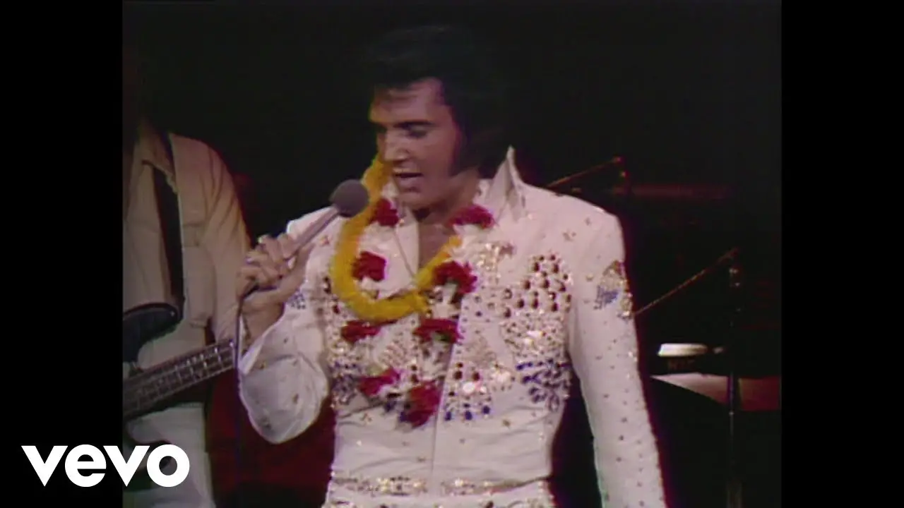 Experience the Legendary Elvis Presley's Iconic Performance of 'Suspicious Minds' Live