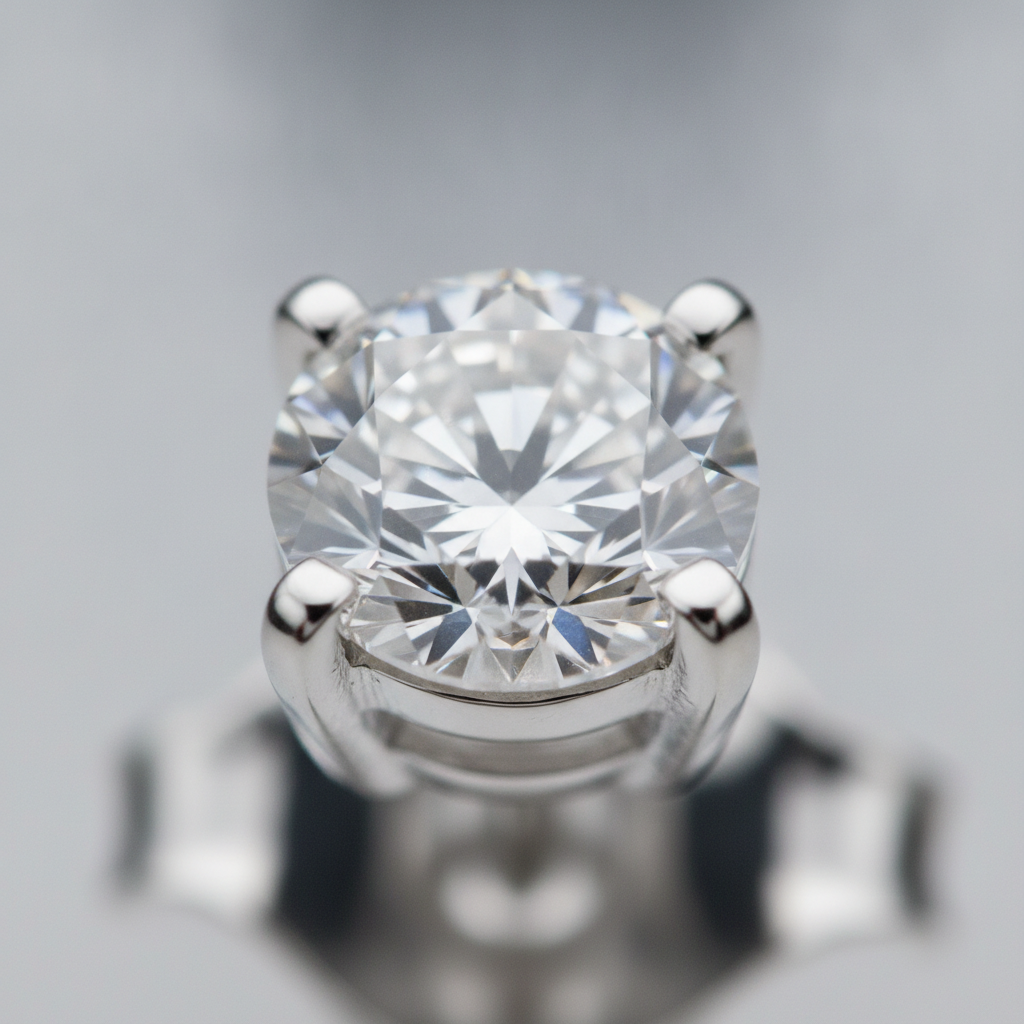 Macro close-up of a lab-grown diamond stud earring in 14k white gold four-prong setting, showing facets and secure prongs for sale diamond earrings shoppers