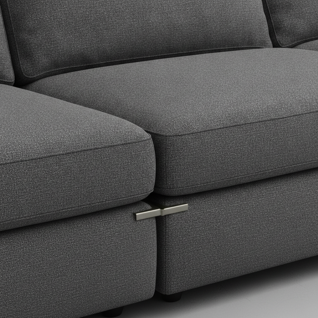 Close-up detail of a modern sectional sofa corner with tight upholstery stitching and performance fabric texture
