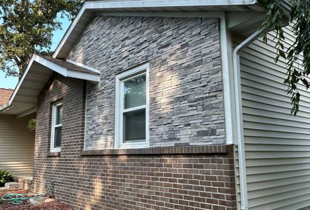 Central Illinois home exterior displaying multiple materials requiring varied pressure washing approaches