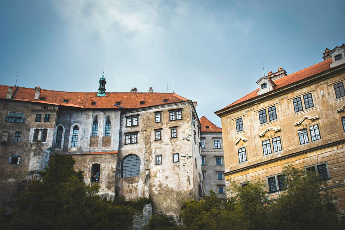 Experience the rustic charm of Česky Krumlov Castle, a historic landmark in South Bohemia.