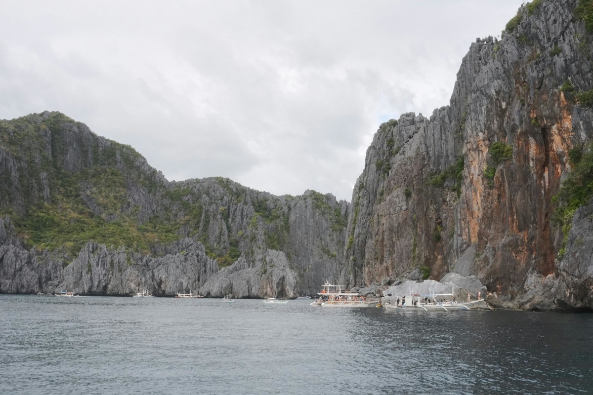 Explore the breathtaking limestone cliffs and serene waters of El Nido, Philippines.