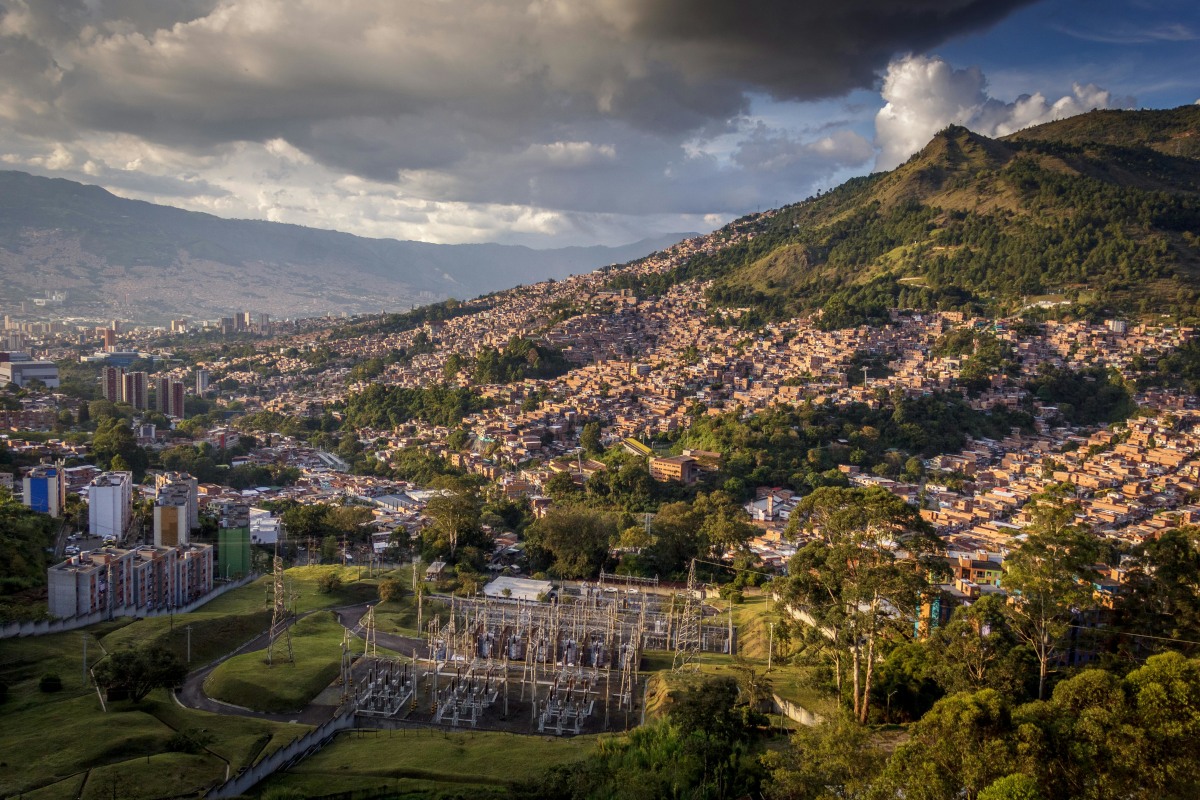 Discover Medellin's urban landscape with sprawling hills and vibrant architecture.