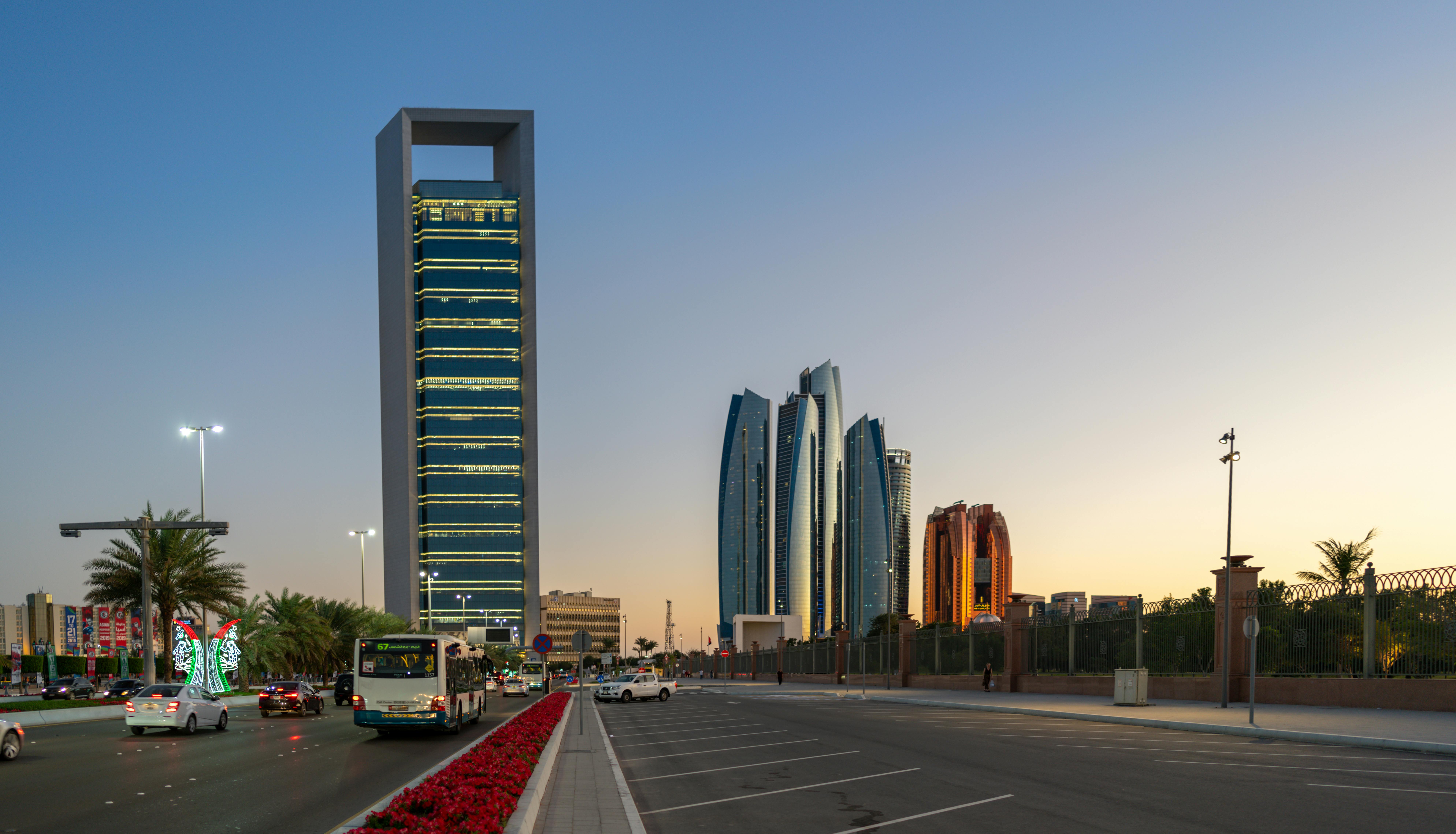 Abu Dhabi Corniche skyline with Etihad Towers at dusk