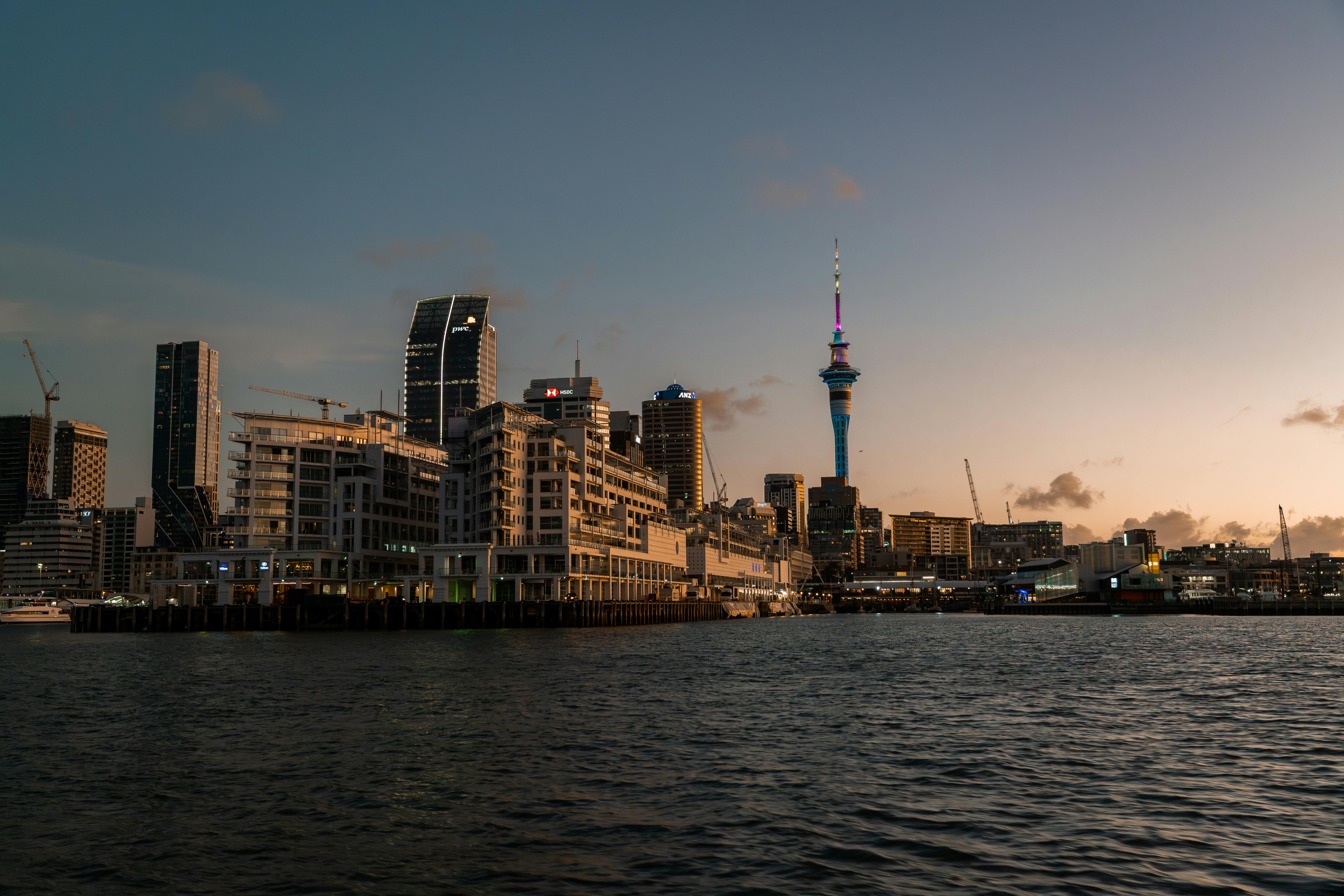 Auckland Sky Tower above Viaduct Harbour at twilight