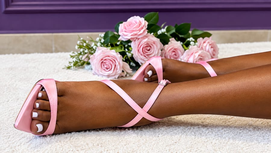 Pink satin heels with roses