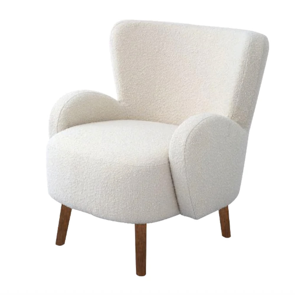 Fauteuil une place en laine bouclée blanc ivoire, avec accoudoirs arrondis et pattes en bois