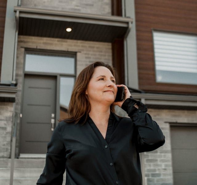 Real estate broker talking on the phone