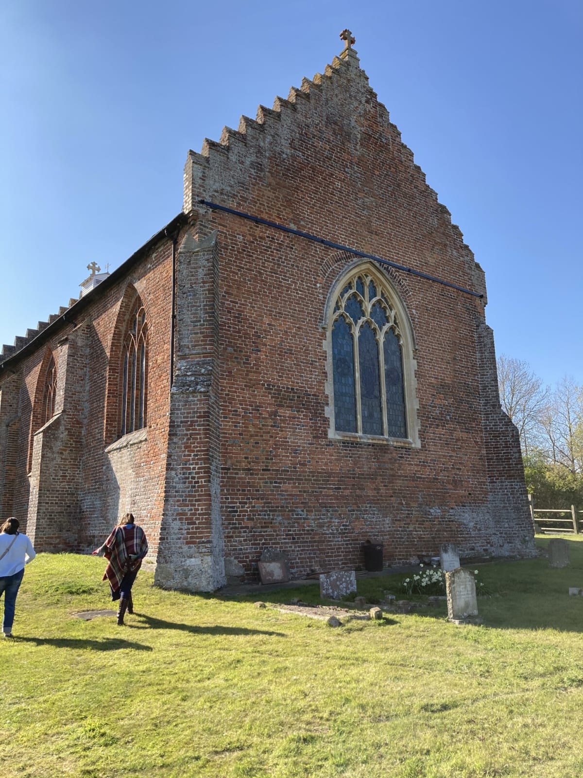 The view of the church from the south east. Note the stepped gables and heavy buttressing