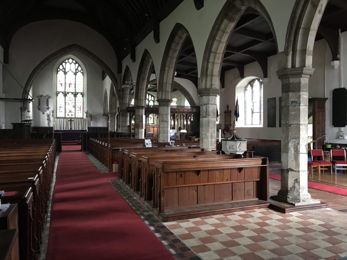 The view of the church interior, looking east towards the altar.