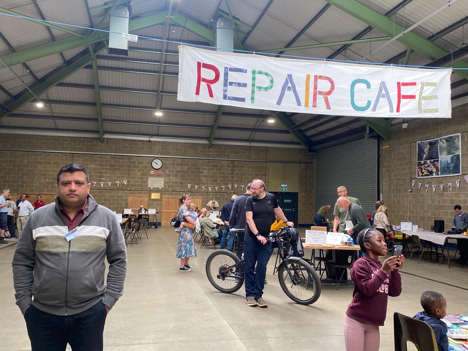 Repair Cafe workbench with tools and repaired items