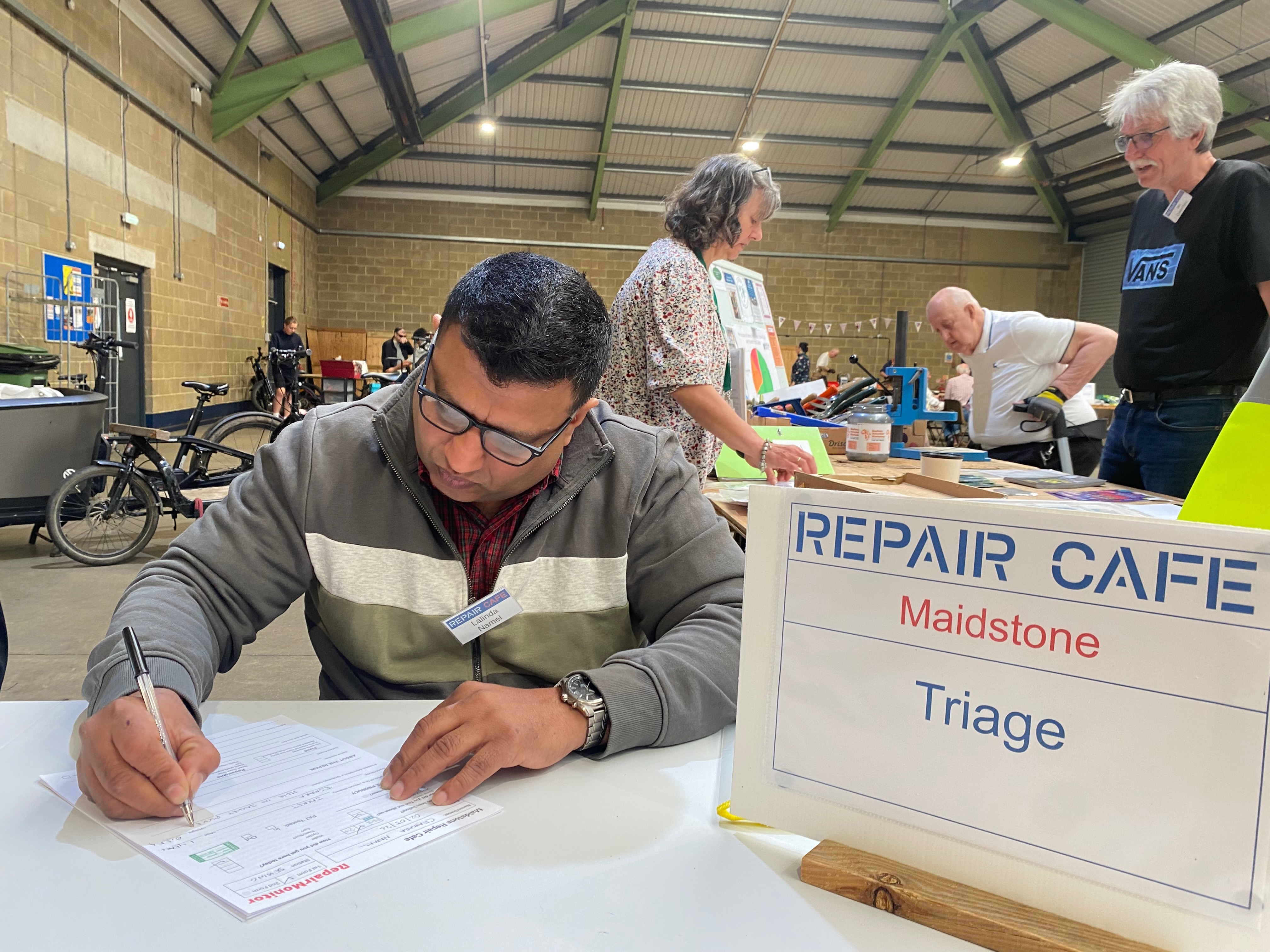 Repair Cafe attendees and volunteers during the 2 May session