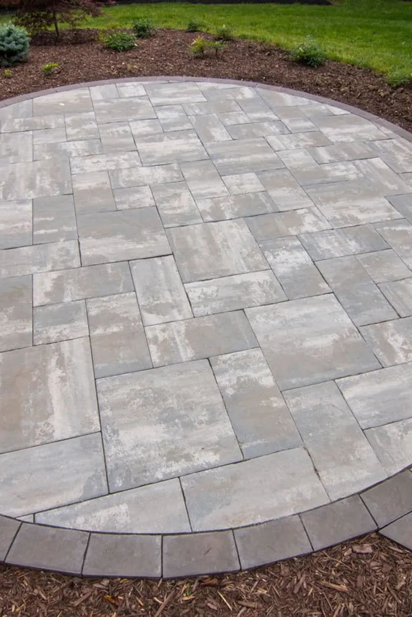 Circular interlocking paver patio design in Edmonton